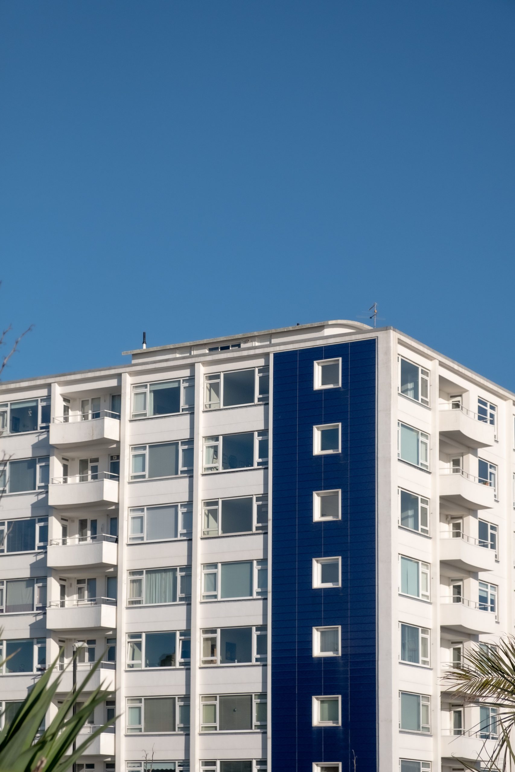 Block of flats with blue sky: Eastbourne